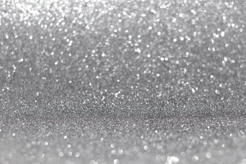 abstract blur white and silver color background with star glittering light for show,promote and advertisee product and content in merry christmas and happy new year season collection concept