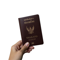 hand holding Thailand passport isolated in white background