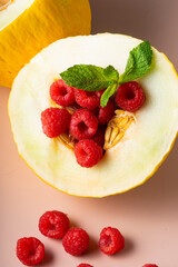 selective focus. fresh ripe fruit, melon and raspberry