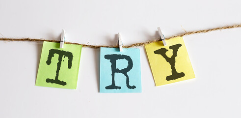 TRY concept - colorful sticky notes with word seo on white background