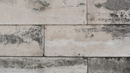 Old concrete block wall background close up