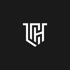 Abstract letter H shield logo design template. Premium nominal monogram business sign. H shield logo design vector