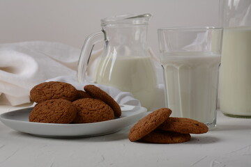 Chocolate chip cookies  with milk on white background
