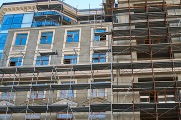 scaffolding and new building as background