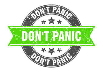 Obraz premium don't panic round stamp with ribbon. label sign