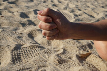 hand on sand