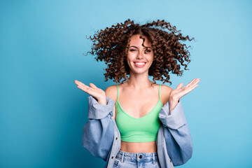 Photo of cute charming cheerful lady smiling having fun clap hands shake head throw fluffy volume...