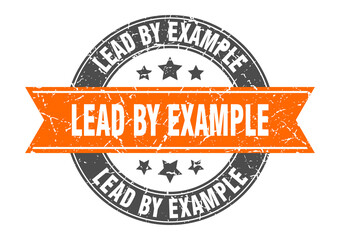 lead by example round stamp with ribbon. label sign