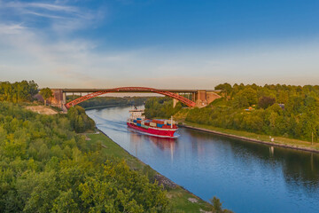 Panorama aerial view of the Levensau High Bridge that spans the Kiel Canal in Kiel-Suchsdorf with...