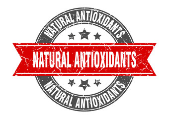 natural antioxidants round stamp with ribbon. label sign