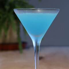 Blue Lagoon in Martini glass close up