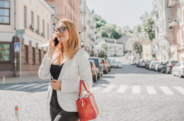 Woman at city, business woman style, fashionable outfit for work. Concept of modern lady lifestyle