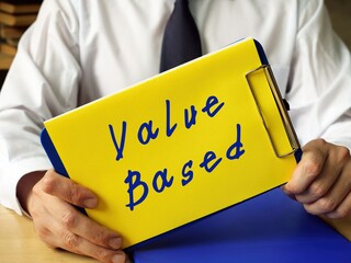 Conceptual photo about Value Based with handwritten phrase.
