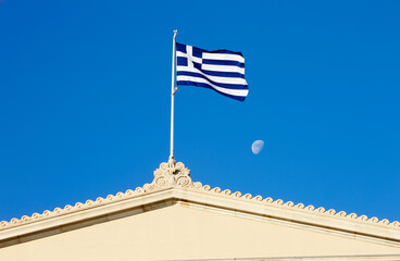 Close up of the Greek flag on the  Greek Parliament building in the Syntagma Square 