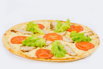 Caesar pizza with fresh salad and tomatoes on a white plate