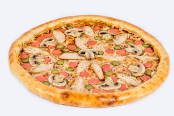 Pizza with mushrooms, pickles, sausage on a white plate