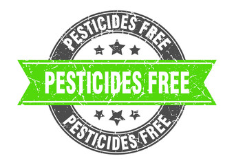 Obraz premium pesticides free round stamp with ribbon. label sign