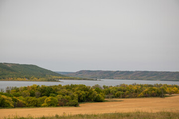 Scenic River Valley with trees in Autumn