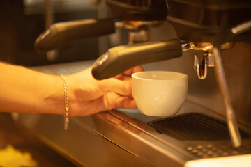 Fototapeta na wymiar Process of preparing, brewing white cup of espresso, americano.