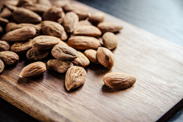 Almonds on a wooden cutting board
