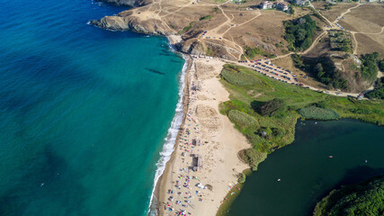 Obraz premium waves on the beach from drone, areal view