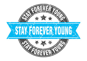 Obraz premium stay forever young round stamp with ribbon. label sign