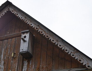 birdhouse, bird house on the roof of the house.