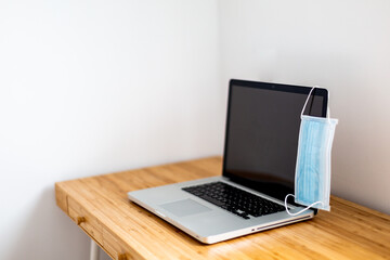 Working in the office in times of coronavirus with a surgical mask