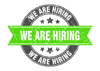 we are hiring round stamp with ribbon. label sign