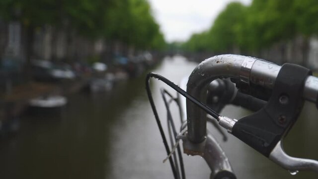close up of an handlebar on a canal in Amsterdam