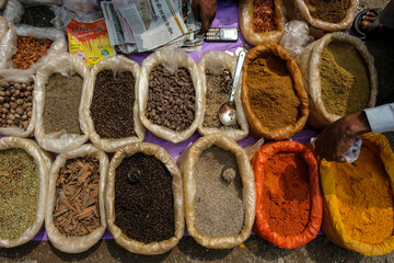 Varanasi, India - September 2020: A man selling spices in the Varanasi market on September 11, 2020 in Varanasi, Uttar Pradesh, India.