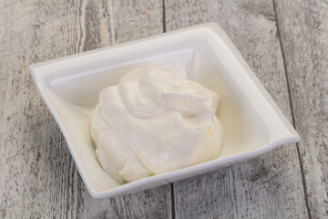 Sour cream in the bowl