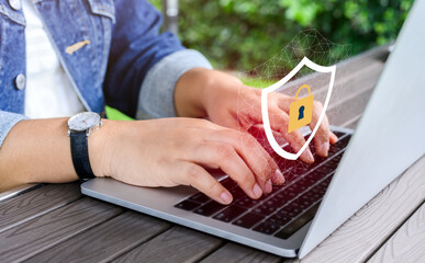 Businesswoman hand using laptop with Data protection, Cyber security secure, information safety and encryption concept. internet technology concept.