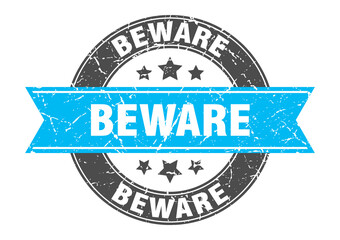 beware round stamp with ribbon. label sign
