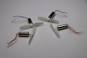 Coreless motor set which is used in making mini drones with propellers on white background