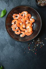 shrimp ready to eat boiled or fried seafood prawn without shell on the table serving top view  copy space for text keto or paleo diet pescetarian food background rustic