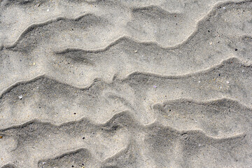 Wellenstruktur im Strandsand
