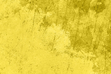 Saturated yellow colored low contrast Concrete textured background with roughness and irregularities. 2021 color trend.