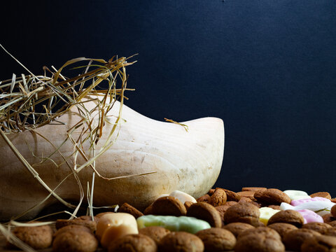 A wooden shoe with hay for the Dutch fest of Sinterklaas. Room for text. 