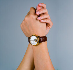 Watch. Stylish mechanical watch on the arm of a man and man.