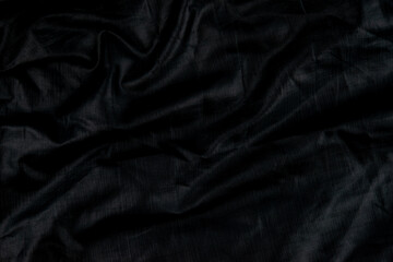 Black abstract background cloth and luxury liquid waves  silk texture satin material