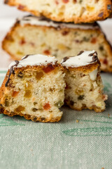 homemade pound cake with candied fruit and icing sugar for tea, copy space