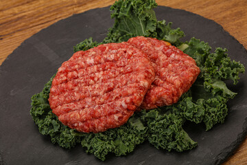 Raw beef burger cutlet for cooking