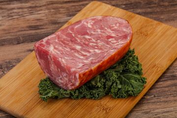 Beef ham piece over board