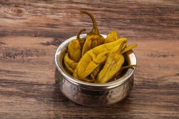 Marinated spicy and hot green pepper