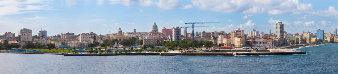 Panoramic view of the historical old Havana city with Spanish colonial, vibrant architecture, iconic buildings, harbor fortress, monuments, parks from Casablanca, the municipal borough of Regla.
