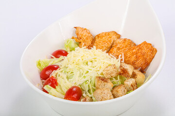 Caesar salad with chicken and parmesan
