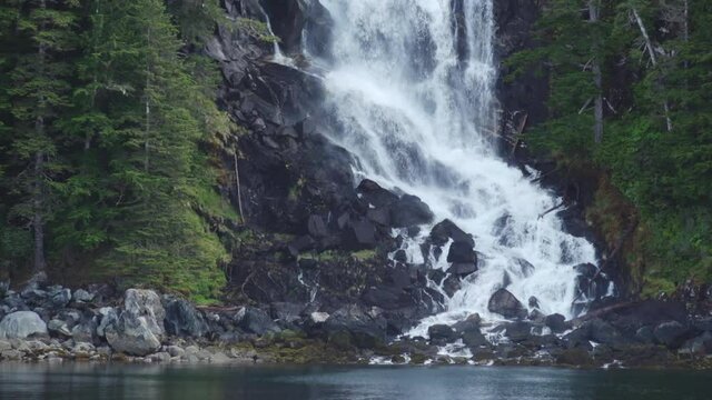 Kasnyku Falls Crashing into Rocks of the Inside Passage at Baranof Island, Southeast Alaska