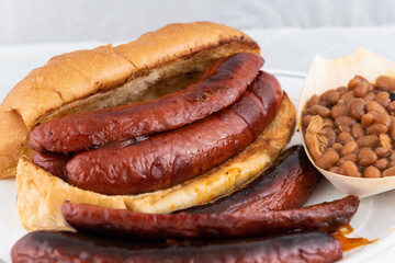 BBQ meal of hot link sandwich and baked beans will taste as delicious as it looks.