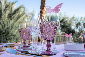 pink Decoration of a crystal cup or glass on a table for a wedding or event